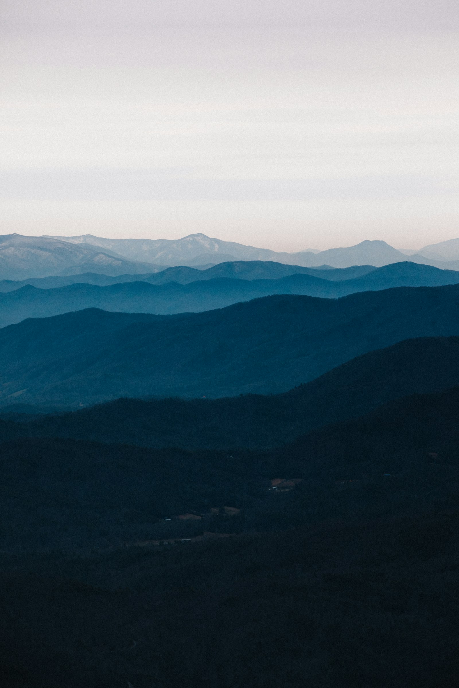Layered Blue Ridge mountain ridgelines in warm afternoon light