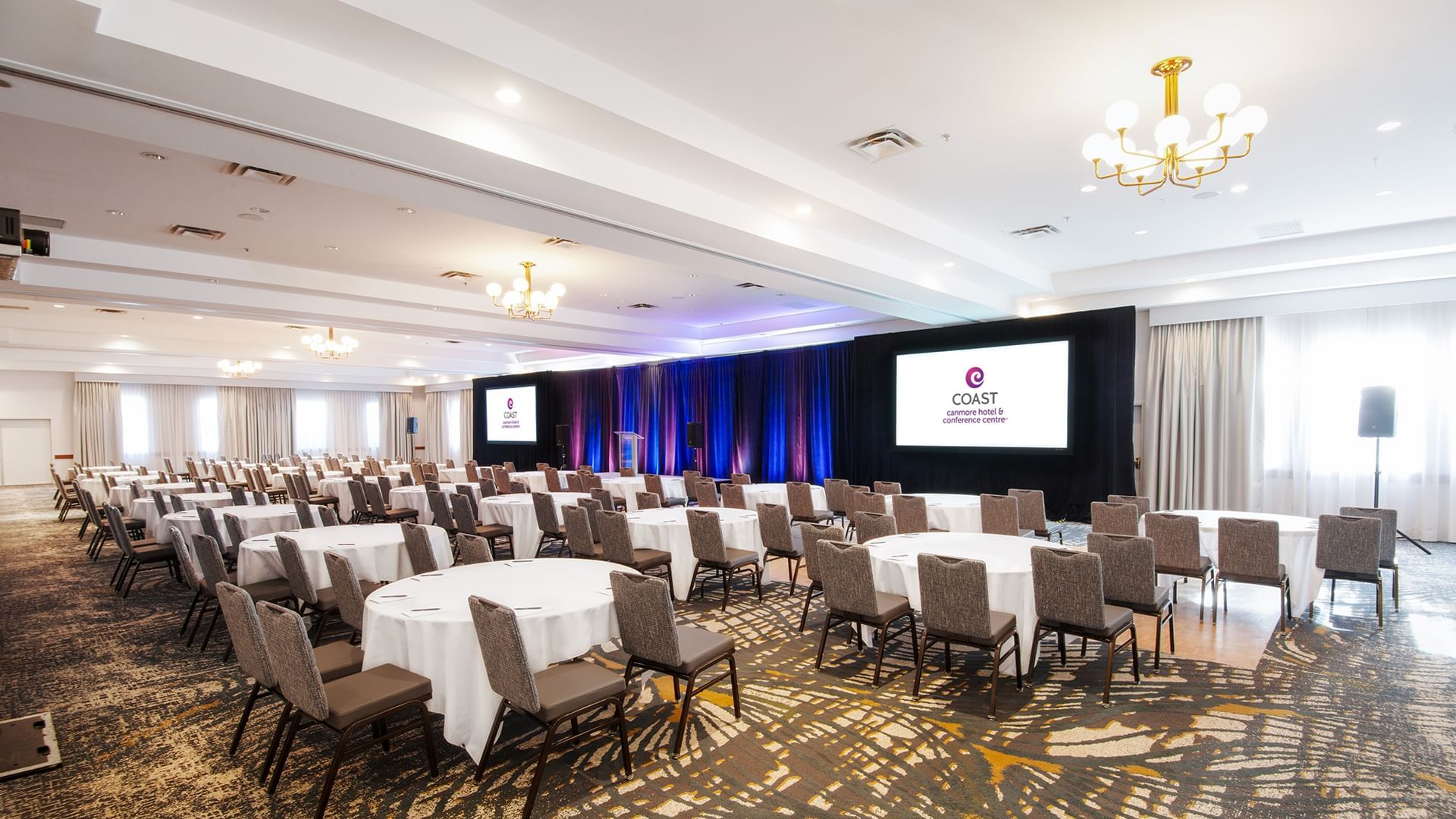 Large conference room set up for a presentation at Apple Mountain