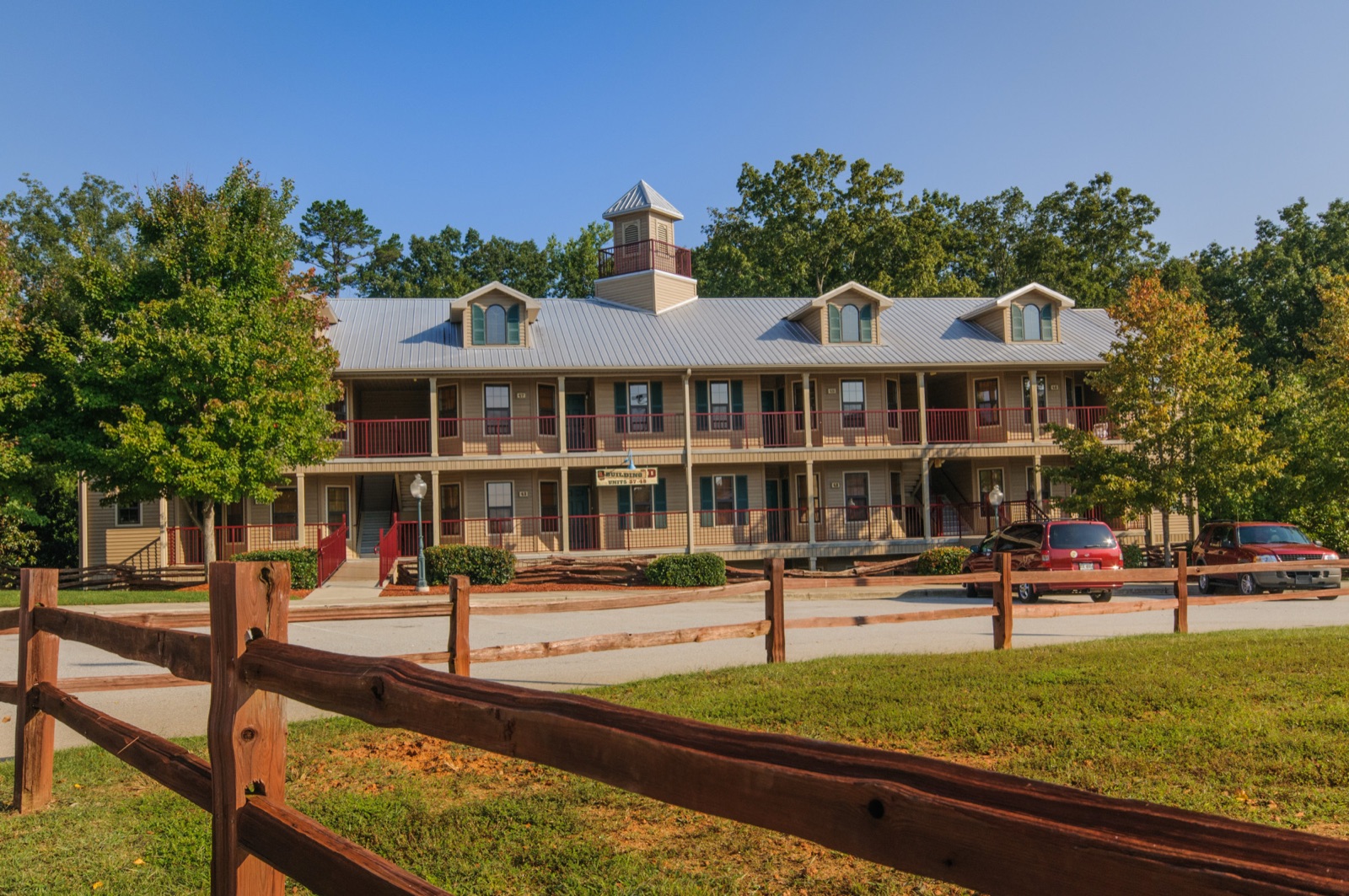 Apple Mountain Resort lodge building with wooden fence