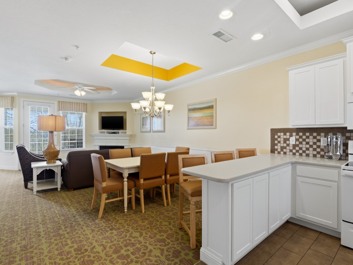 Presidential Suite open living area with kitchen and dining